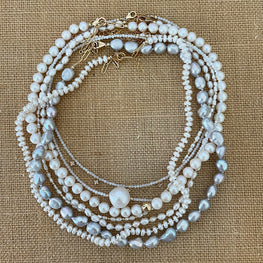 knotted white pearls necklace